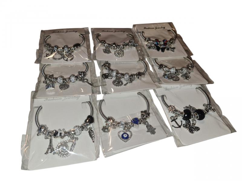 PULSERA ELASTICA C/DIJES STRASS X UNID