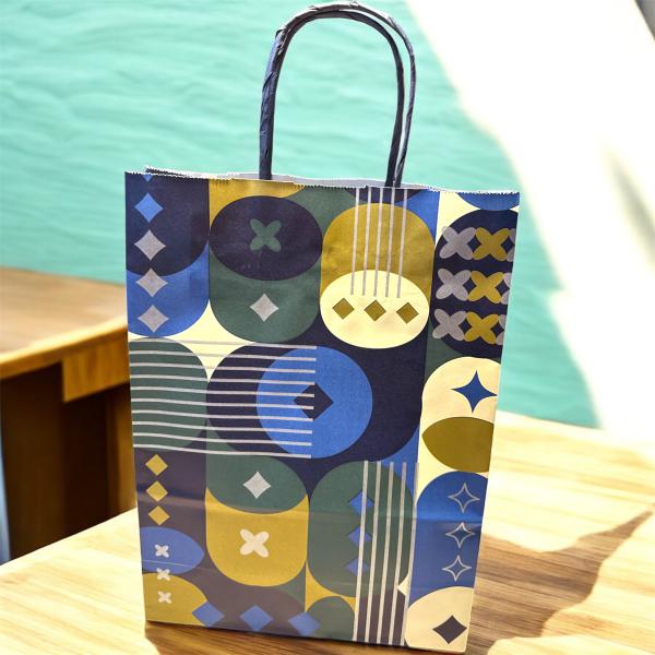 BOLSA 22*10*30 GEOMETRICOS TONOS AZULES