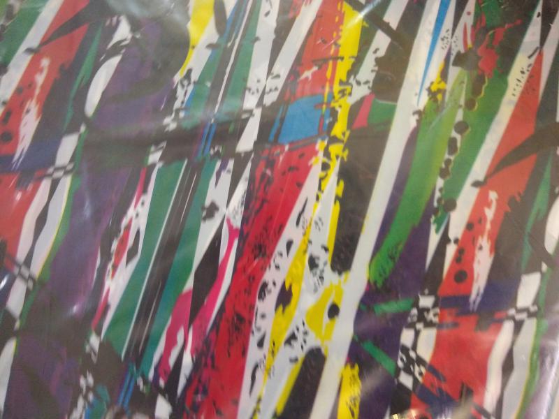 BOLSA RIÑON 35*45 X 50 COLAGE MULTICOLOR