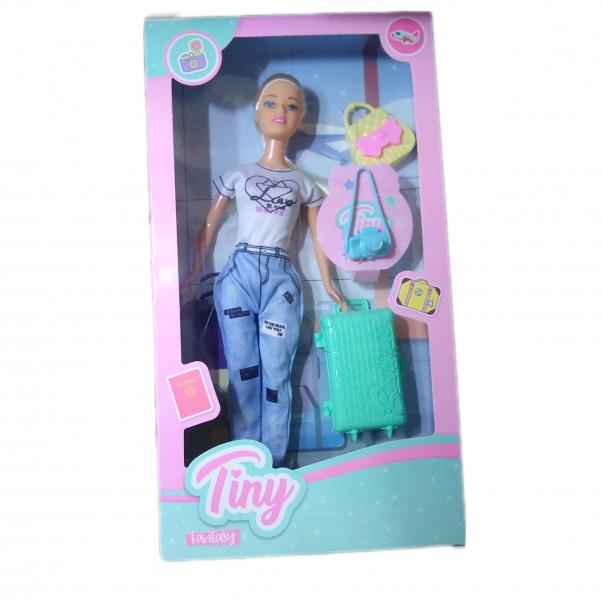 MUÑECA TINY VIAJERA 18X32CM