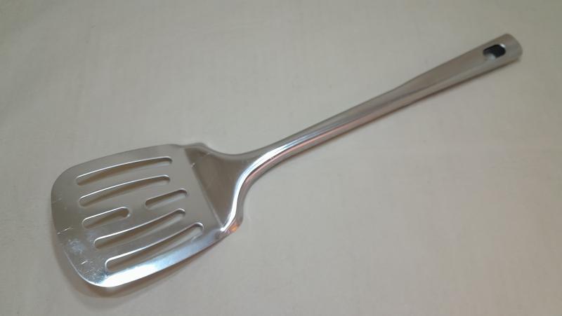 A.INOX * ESPATULA 1 PIEZA CALADA 33CM