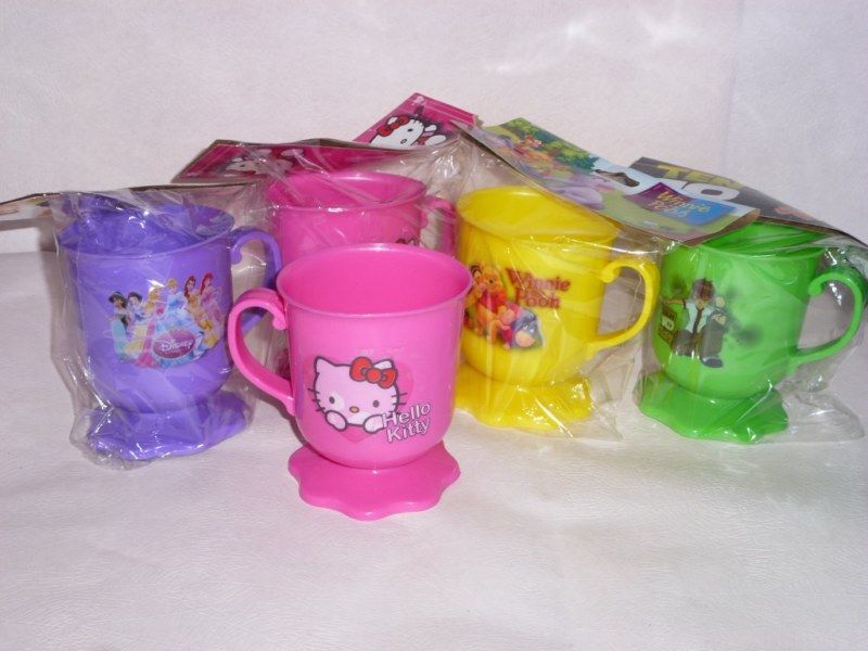 TAZA C/BASE FLOR DE PERSONAJES 10 CM